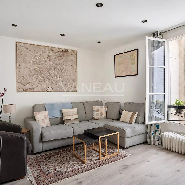 Appartement familial lumineux traversant cour et jardin -