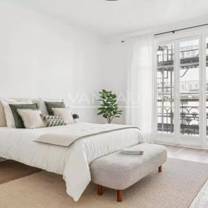 Paris XVIe - Jasmin - Appartement de réception en étage élevé av