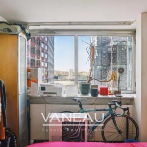 Paris XVe Vue Seine - Charles Michels 2 pièces