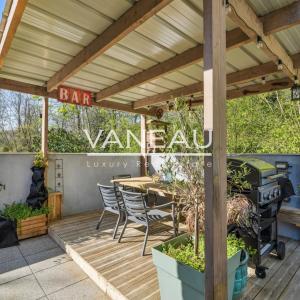 Maison d'architecte sur terrain arboré