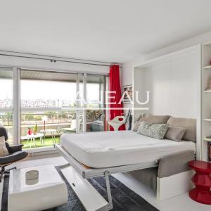 Studio lumineux de 30 m² en étage élevé - Bon état - Vue dégagée