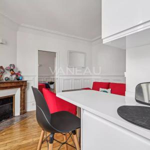 Dernier étage deux pièces vue toits 29.06 M²
