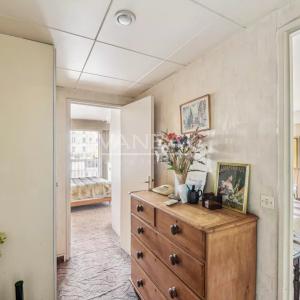 Paris XVIIIème - Beau trois pièces avec balcon et box -