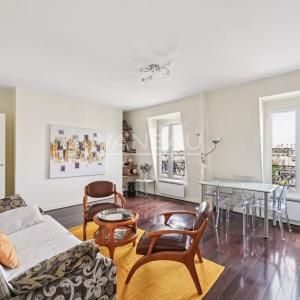 Paris XVe - Montparnasse - Appartement trois pièces en dernier é