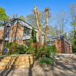 Maison d'architecte sur terrain arboré