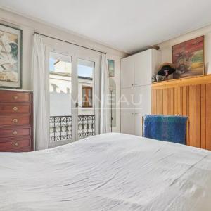PARIS V - ETAGE ELEVE - BALCON