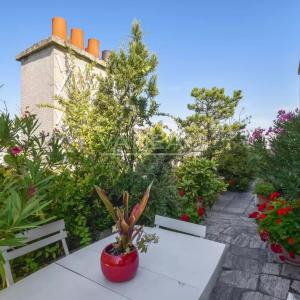 Paris XIVe – dernier étage avec terrasse panoramique