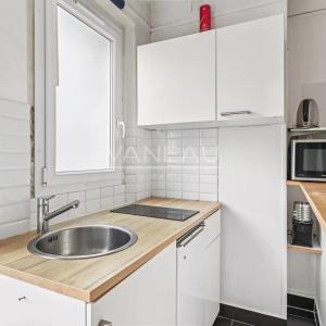 PARIS XVIIIe - Guy Moquet / rue Championnet - Studio lumineux et