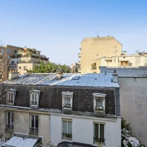 Bel appartement traversant de 58 m² – Lumière, volumes et charme