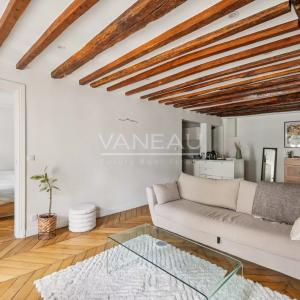 Paris IXe - Charmant deux pièces - Parquet, moulures, poutres et