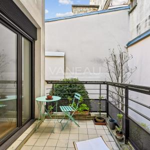 PARIS XVe - Commerce : Appartement familial avec balcon au calme