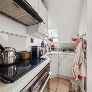 Boulogne centre - Trois pièces dernier étage avec balcon