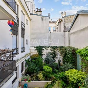 PARIS XVe - Commerce : Appartement familial avec balcon au calme