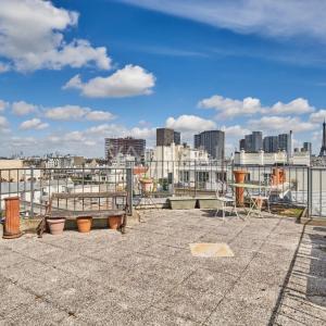 Paris XVeme –  Bergers/ Saint Charles– Loft atypique avec toit-t