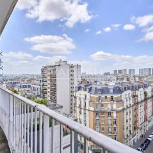 PARIS XVe - Mairie : Appartement avec balcons et vue dégagée sur