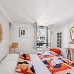 Exclusivité - Paris 14 - Montparnasse/Notre Dame des Champs -Trois pièces au dernier étage avec ascenseur