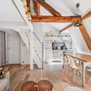 Exclusivité - Paris 14 - Montparnasse/Notre Dame des Champs -Trois pièces au dernier étage avec ascenseur