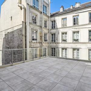 Paris IXe - Saint Georges / Rue des Martyrs - Maison de ville rénovée avec rooftop 42 m2 DPE C