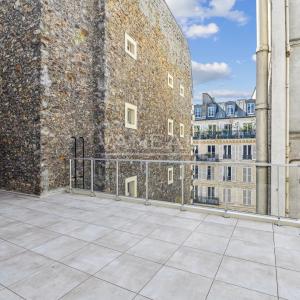 Paris IXe - Saint Georges / Rue des Martyrs - Maison de ville rénovée avec rooftop 42 m2 DPE C