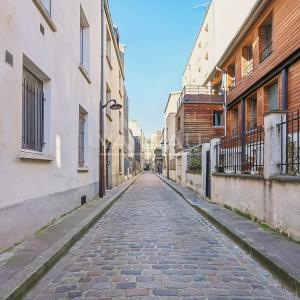 Paris XVIIIe - Maison de ville familiale avec cour arborée à l'avant plein sud -