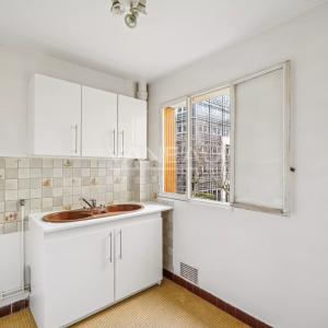 Paris XIIe - Picpus : Appartement une pièce transformable en deux pièces, balcon au calme