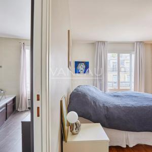 PARIS XVI - Appartement familial avec extérieur, en étage élevé.