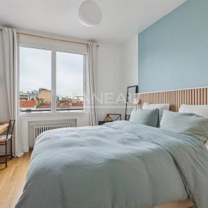 Paris XVIe - Auteuil Sud - Appartement familial quatre chambres en étage élevé. Vue Dégagée.