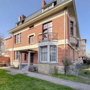 Magnifique Hôtel de maître de ± 600 m², jardin et garage