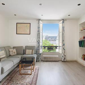 Appartement familial lumineux traversant cour et jardin -