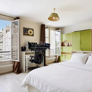 Appartement familial lumineux traversant cour et jardin -