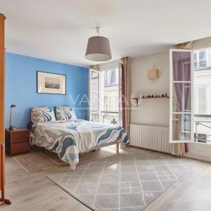 Appartement familial lumineux traversant cour et jardin -