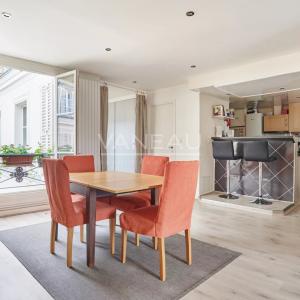Appartement familial lumineux traversant cour et jardin -