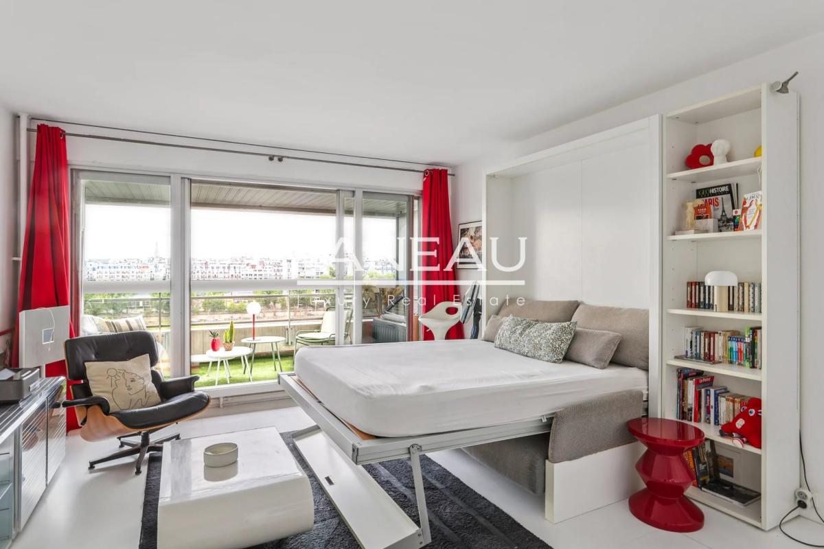 Studio lumineux de 30 m² en étage élevé - Bon état - Vue dégagée