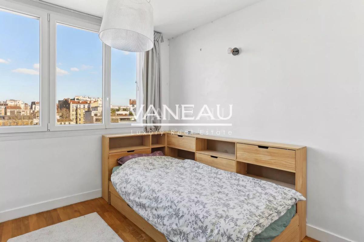 Appartement familial en dernier étage avec quatre chambres