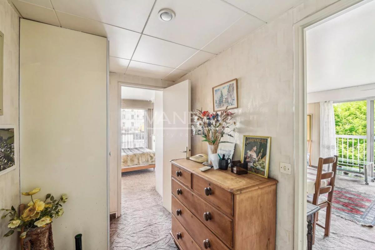 Paris XVIIIème - Beau trois pièces avec balcon et box -