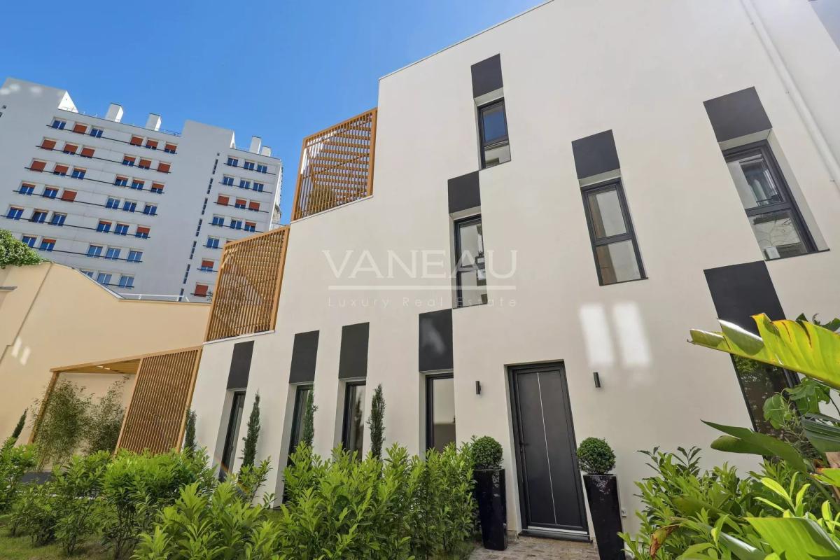 Maison neuve avec terrasse et jardin