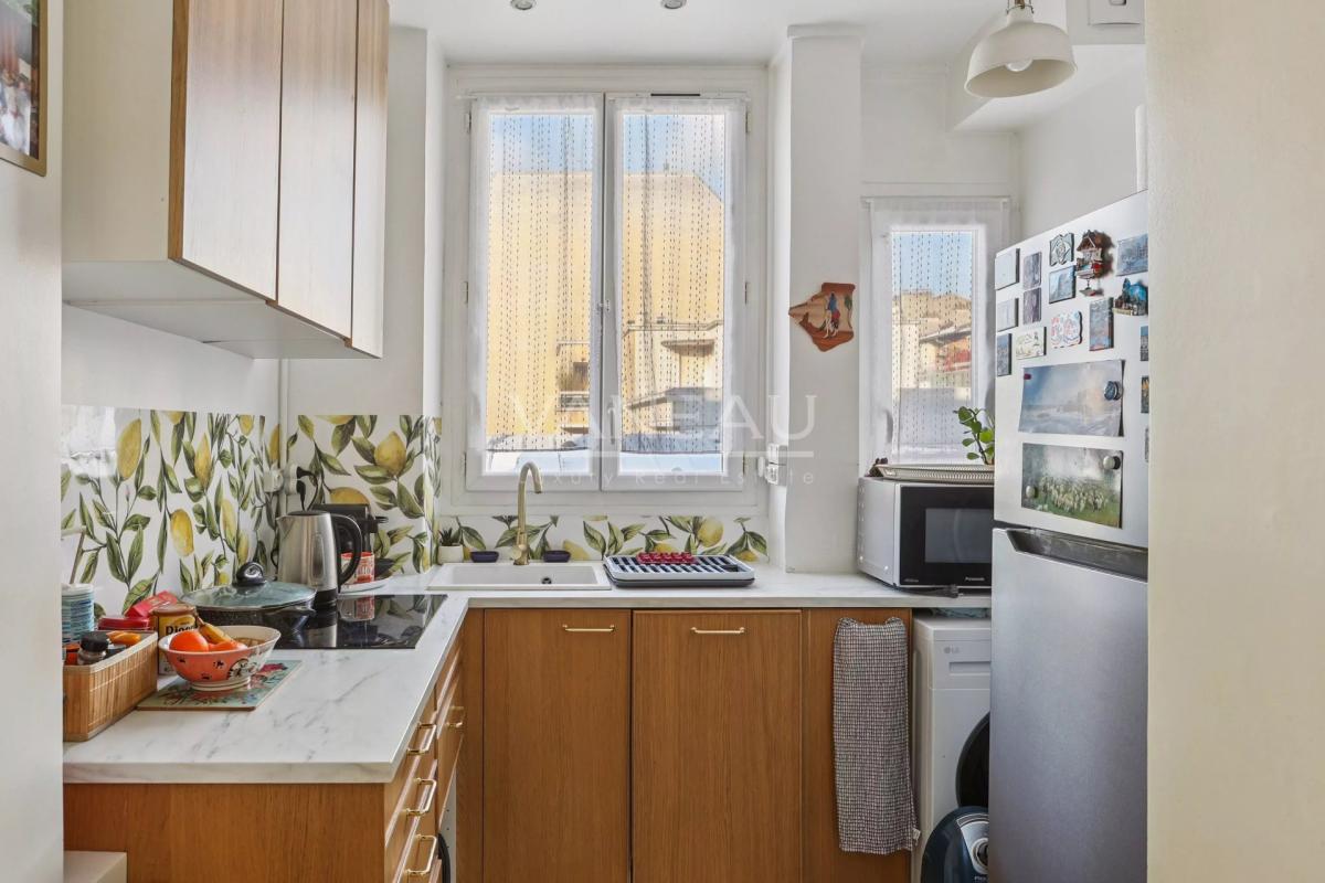 Bel appartement traversant de 58 m² – Lumière, volumes et charme