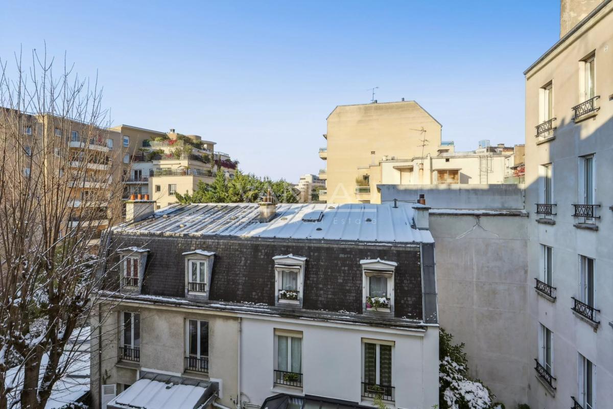 Bel appartement traversant de 58 m² – Lumière, volumes et charme