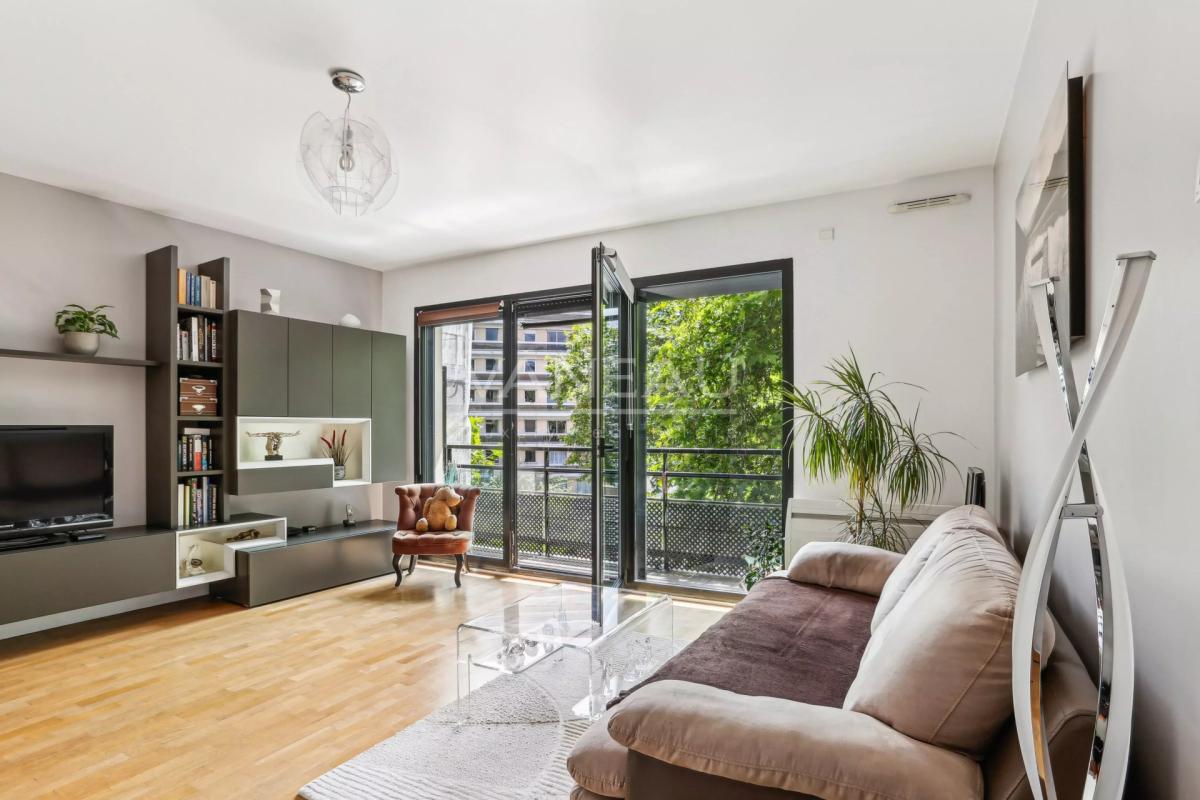 Deux pièces avec balcon exposé sud - immeuble moderne