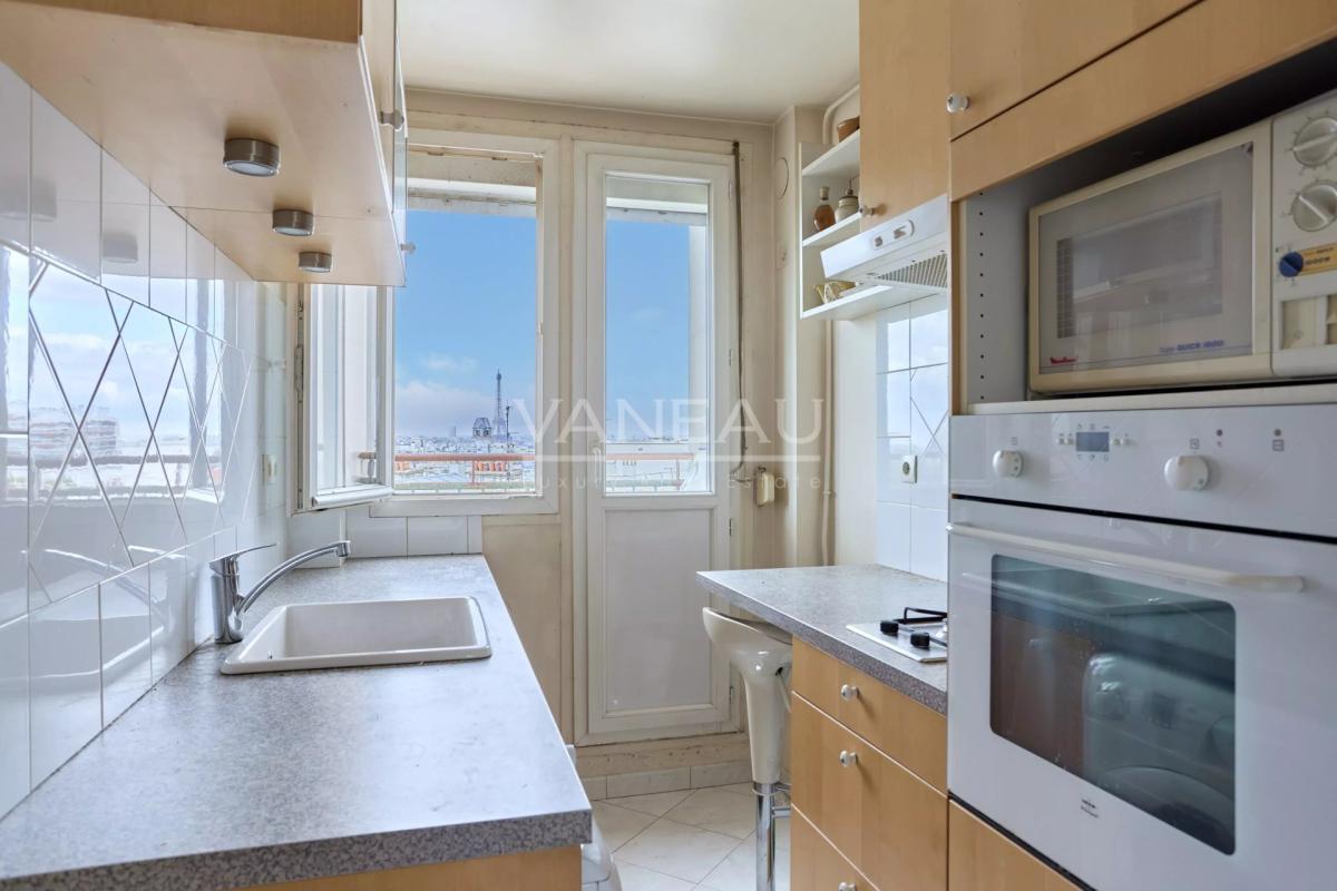 PARIS XVe - Dernier étage, balcons / Vues ciel et monuments