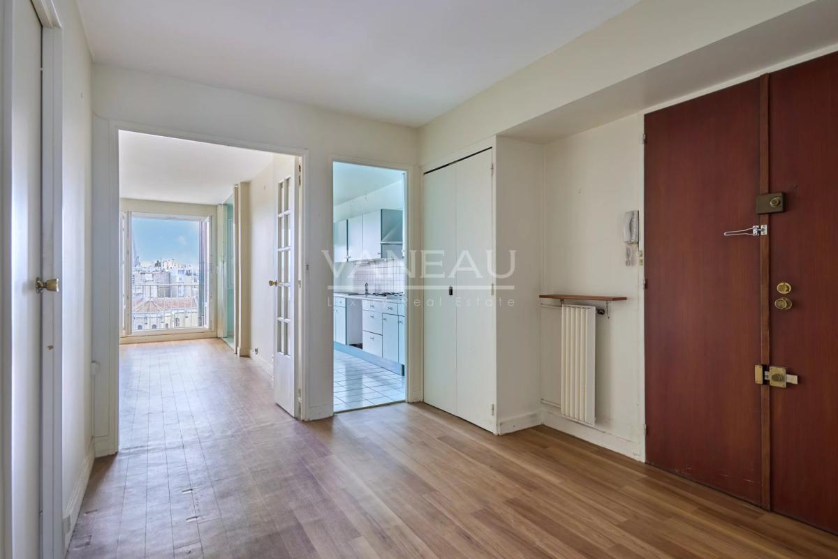 PARIS XVe - Mairie : Appartement avec balcons et vue dégagée sur