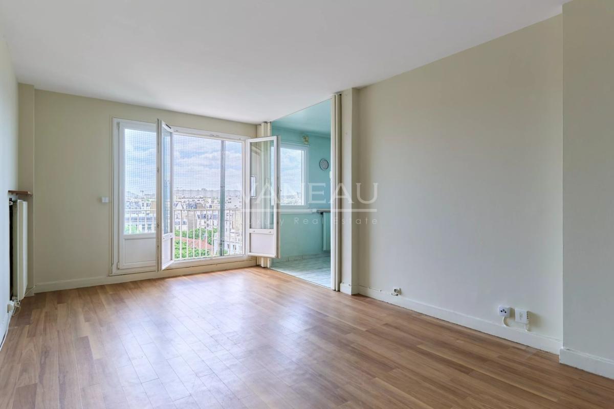 PARIS XVe - Mairie : Appartement avec balcons et vue dégagée sur
