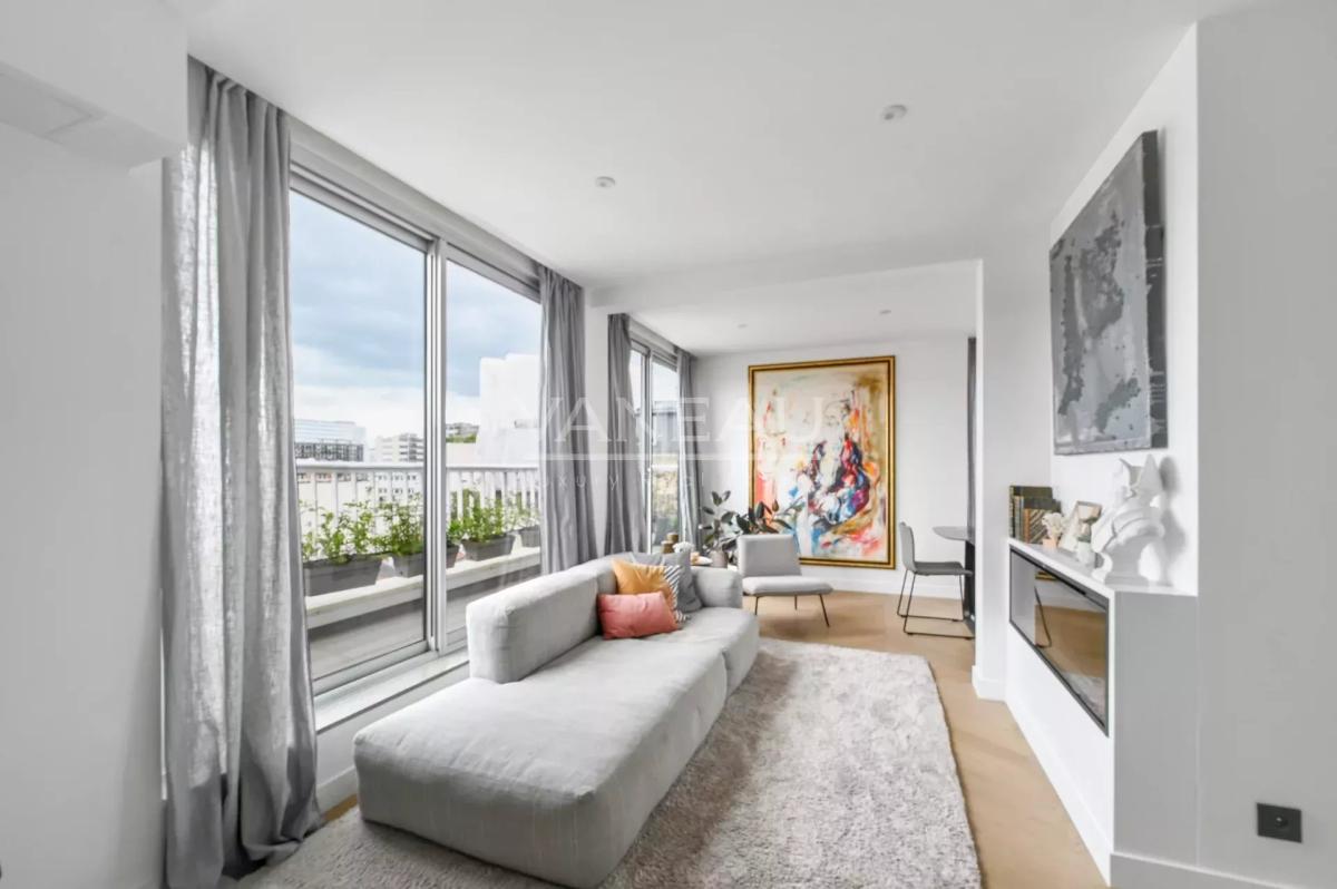 Appartement d'exception avec vue imprenable sur la Tour Eiffel - Etage élevé avec balcon filant et arboré -