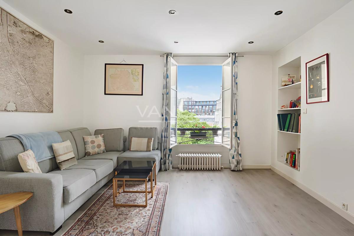 Appartement familial lumineux traversant cour et jardin -