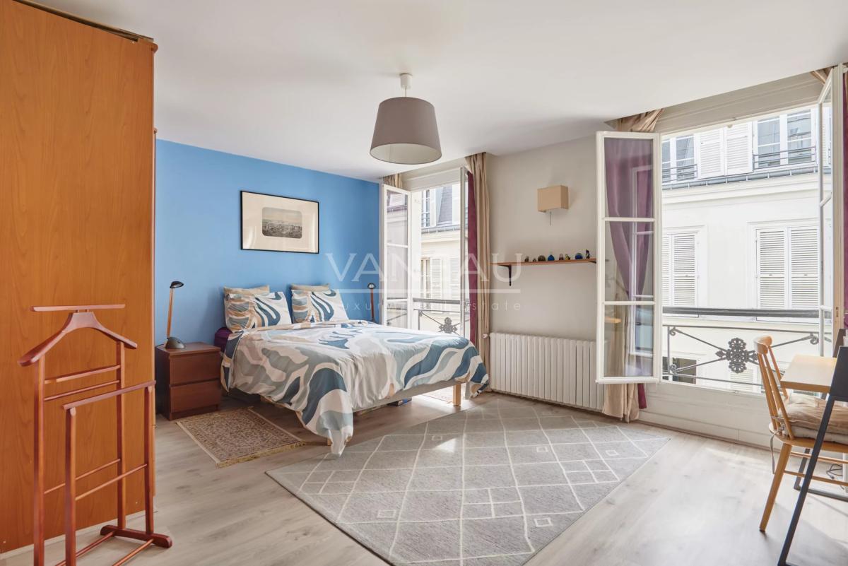 Appartement familial lumineux traversant cour et jardin -